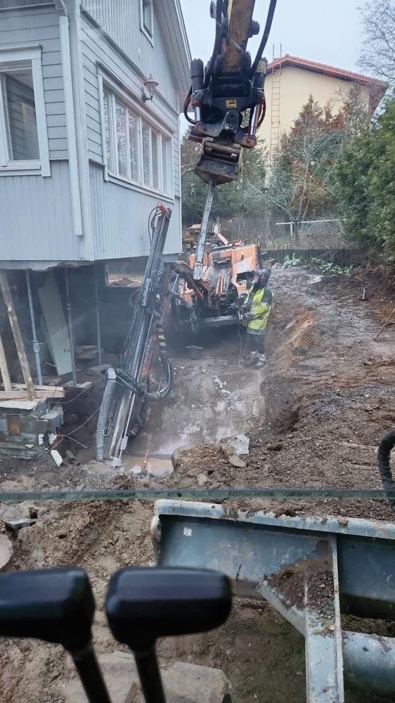 Vanhan OKT:n alle uusi kellari, julkisivuremontti, laajennus ja autotalli