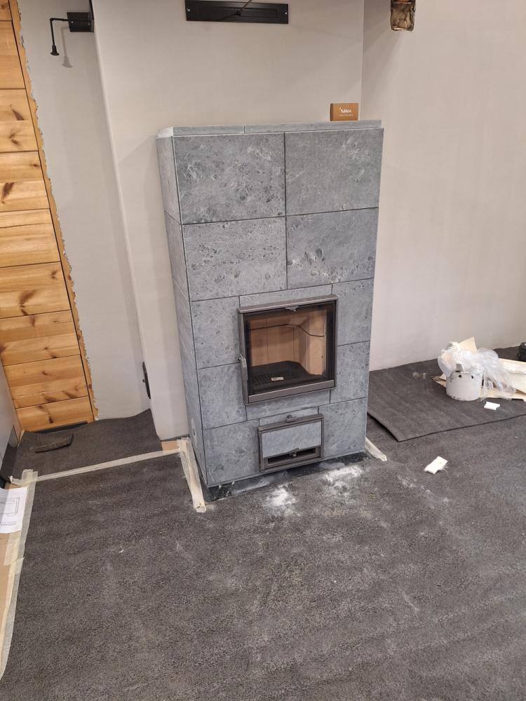 Uunien muuraus. Ja valmispiippujen asennus