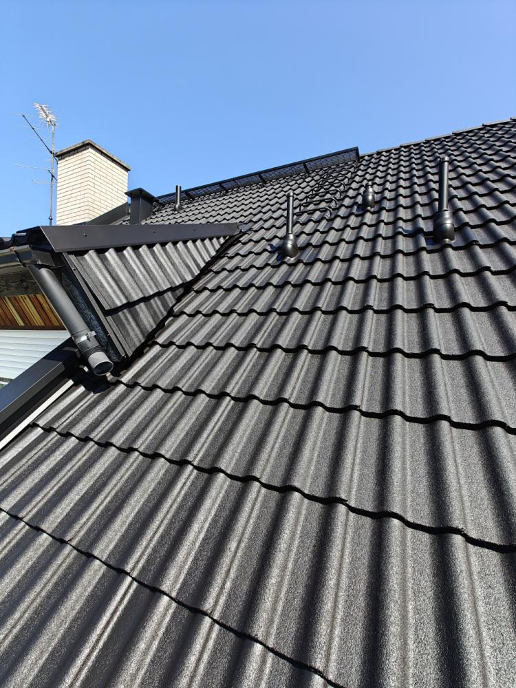 Tiilikaton pesu ja pinnoitus