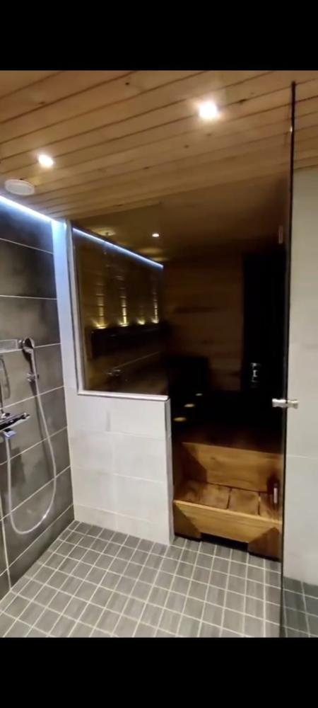 Kylpyhuoneen ja saunan laajennus