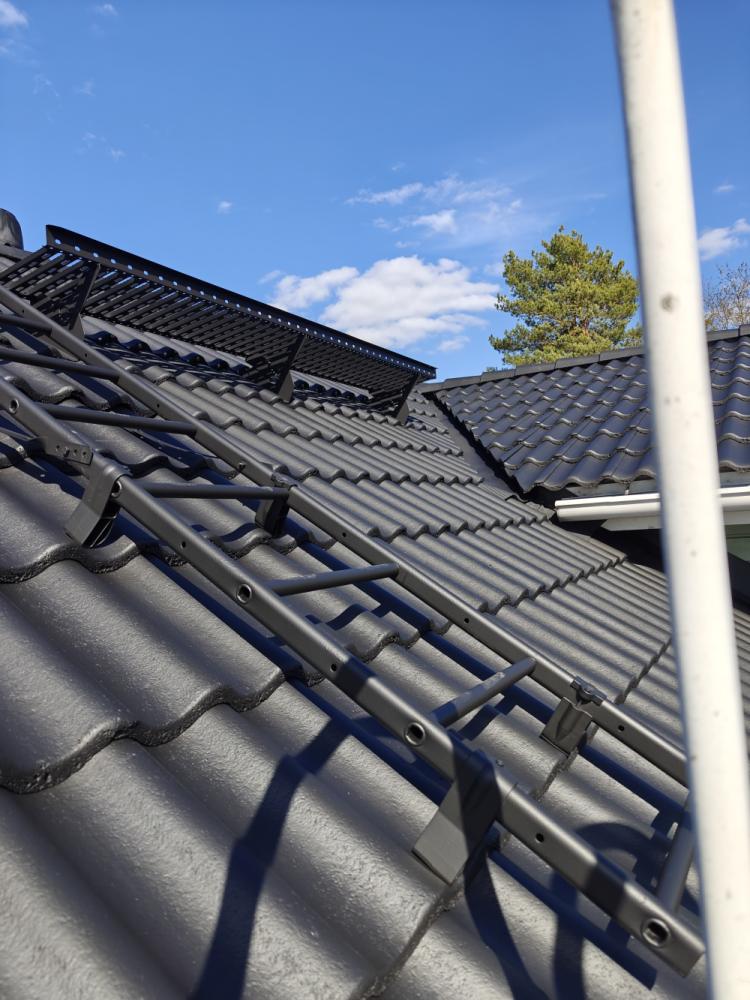 Tiilikaton pesu ja pinnoitus