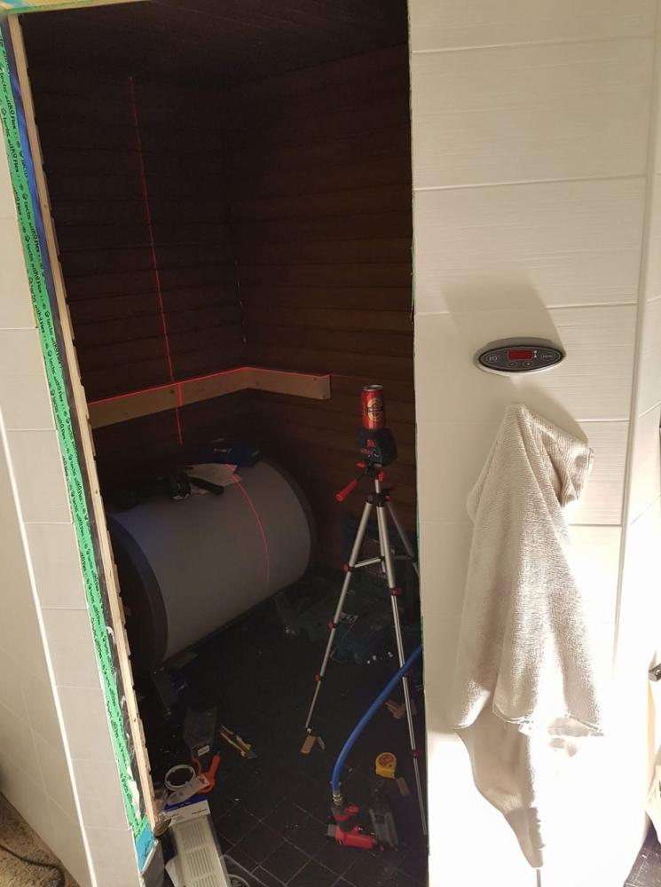 Saunan lauteet, panelointi ja kylpyhuoneen laatoitus